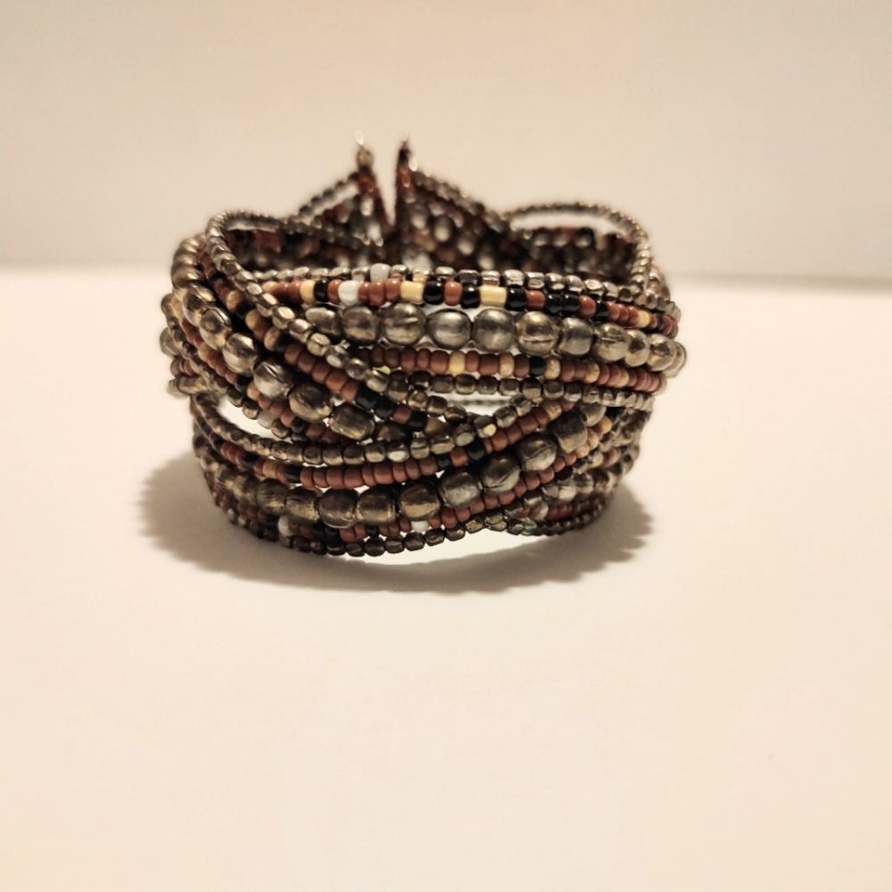 Well made Wide gold, black, and brown beaded cuff bracelet